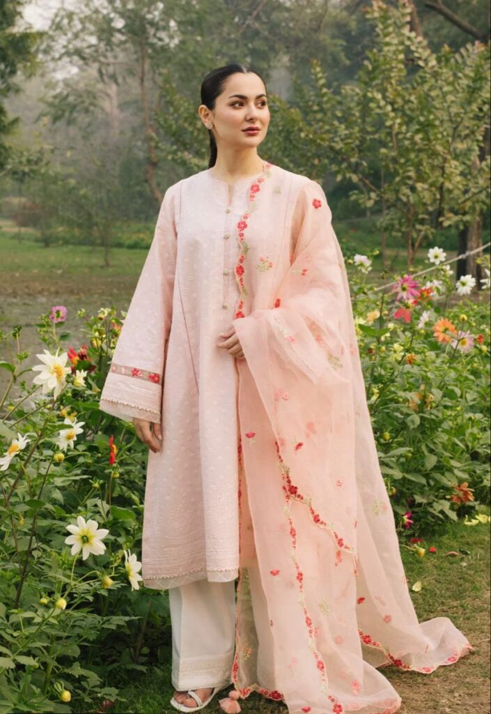 women in a pink modest wear